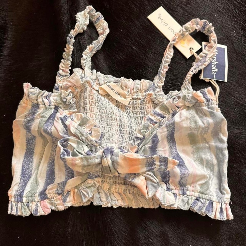 Multi-colored striped crop top with ruffles and ties In the front